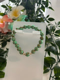 Bracelet Perles de Verre Turquoise Marbré – Charm Doré