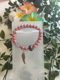 Bracelet Perles BODHI Roses à Pois – Charm Aile Argentée