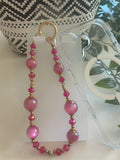 Grigri Téléphone Perles Fuchsia & Dorées