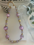Grigri Téléphone Perles Mauves & Dorées